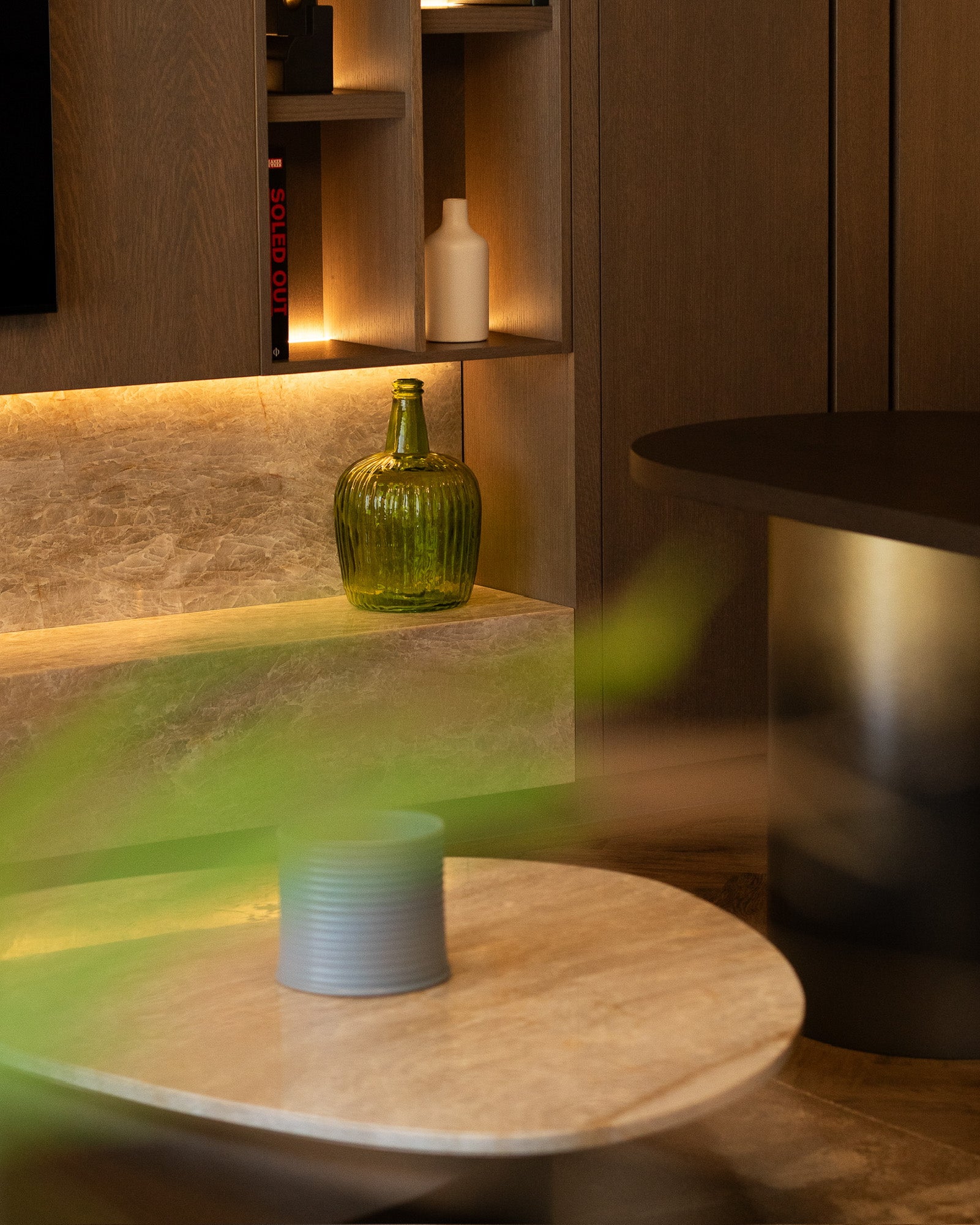 Luxury study featuring bespoke joinery, stone detailing and integrated ambient lighting