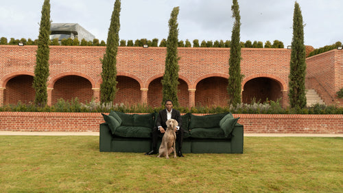 Luxury outdoor living setting featuring bespoke seating within a landscaped private residence