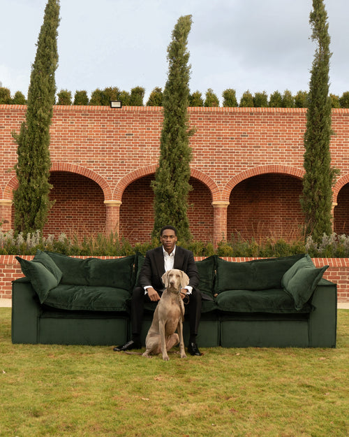 Luxury outdoor seating arrangement within a landscaped private residence
